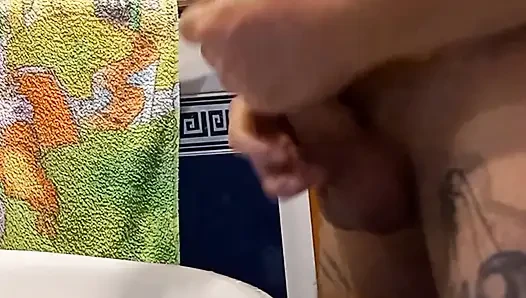 Bitch masturbates my cock in the bathroom with my continuation and cum