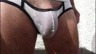 Wet white jock outdoors shows all