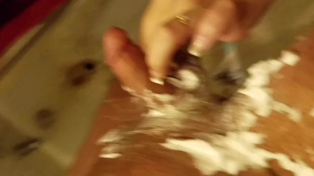 Baby girl shaves daddy