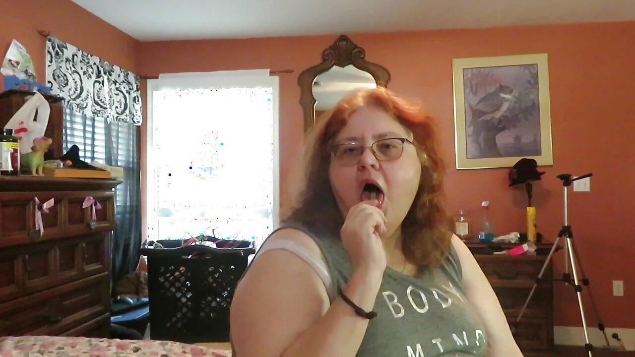 BBW nurse Vicki enjoys eatting a chocolate vanilla ice cream popsiscle