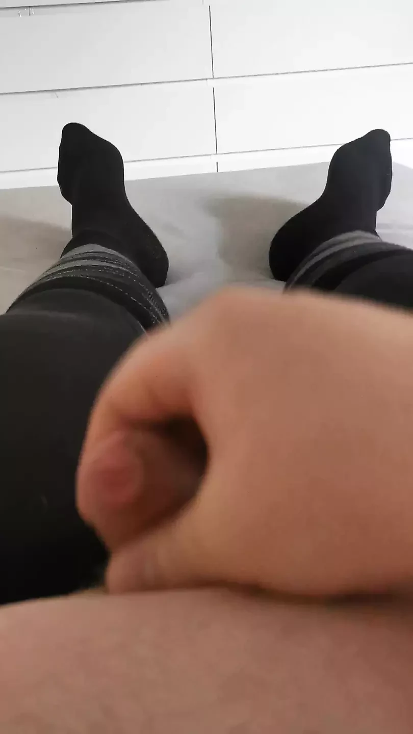 Fat man masturbates in riding leggings and riding socks