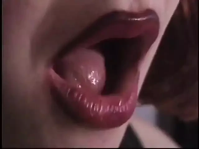 Round-assed leather BDSM hottie whips kneeling white slave guy's ass and balls