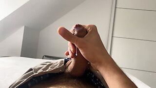 Curved uncut cock shooting a load
