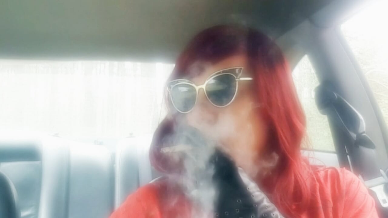 YOUR RED HEAD AUNT RUTHIE DESTROYS A MARLBORO 100 IN HER CAR