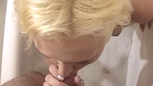 Hot blonde dropping to her knees to suck his small dick