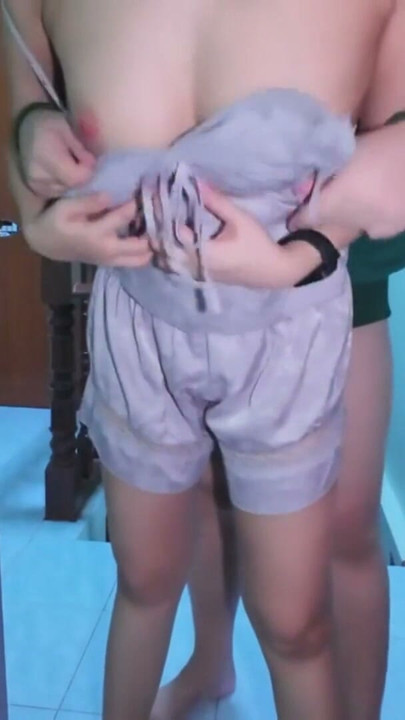 a Thai girl in front of the door of the room Cum shot in | Clip 1