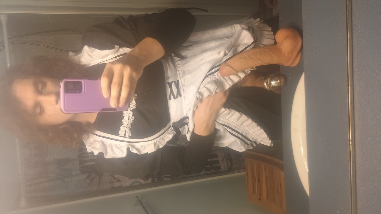 Humiliated sissy slams massive dildo in her asshole while in chastity leaving it gaped