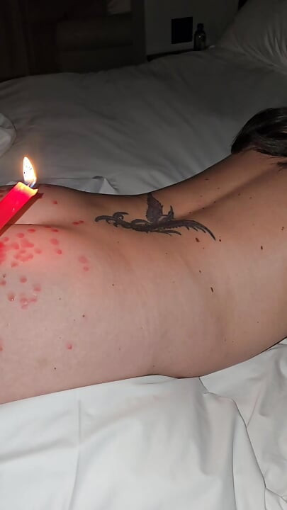 He drips wax on my ass and then cums on my pussy to cool me off!
