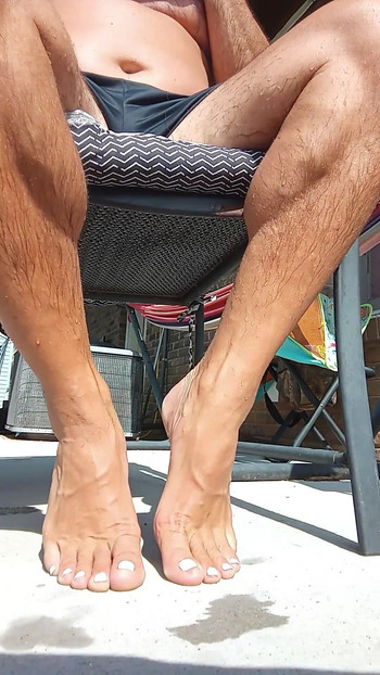 Showing off my new pedicure and wet shriveled up dick