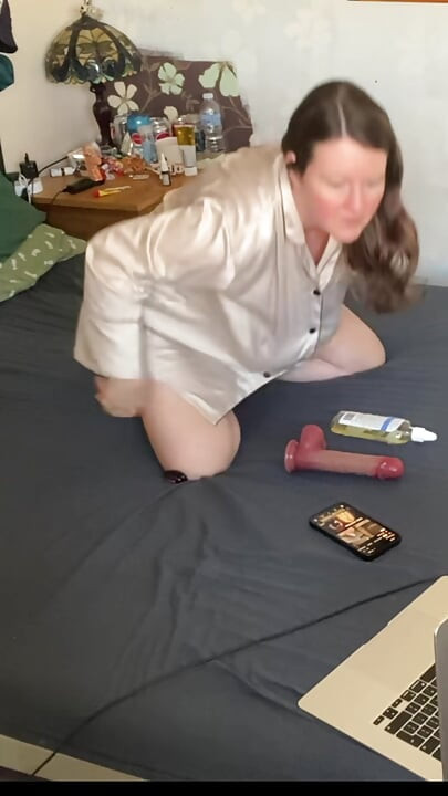 oiled up and feeling horny watching porn on the MacBook