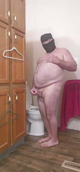 Nasty completely nude exhibitionist in the bathroom.