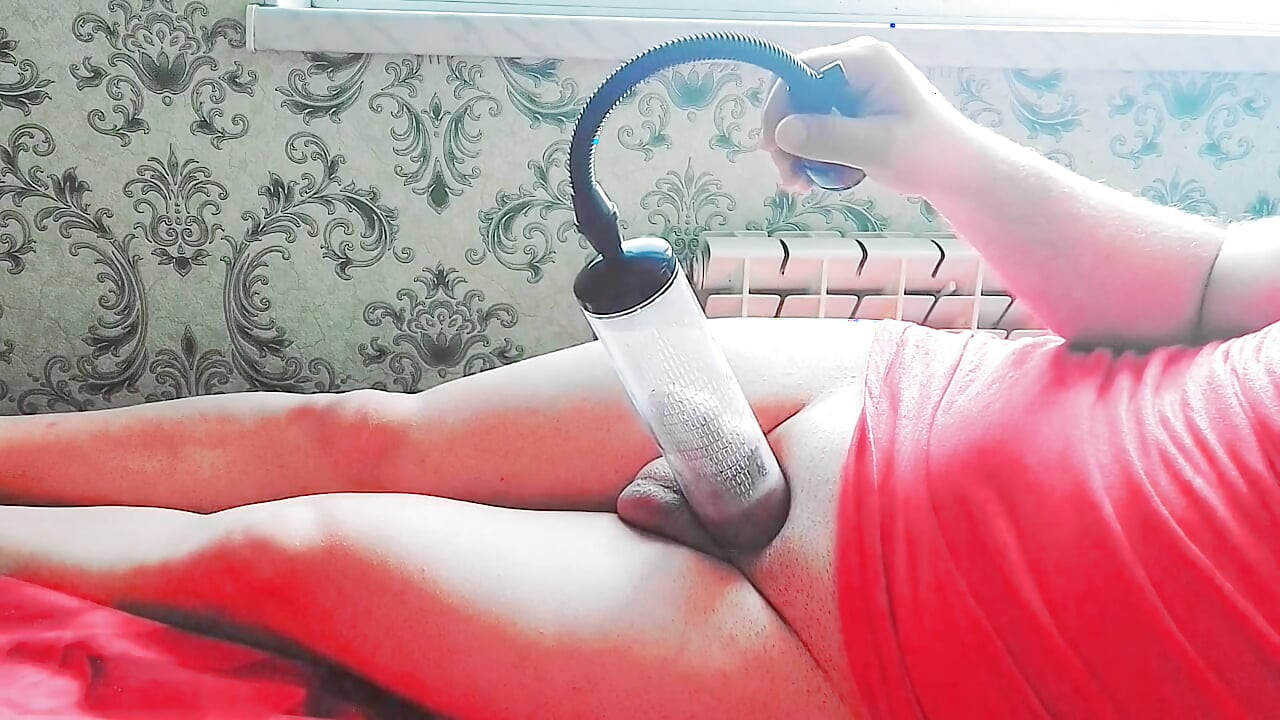 Playful trans beauty showing bare shoulders in candlelight
