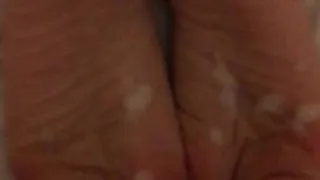 Younger man's cumshot on mature wife's wrinkled soles