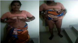 Indina desi telugu aunty showing her boobs and pussy