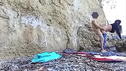 On a beach sex at the risk of being seen