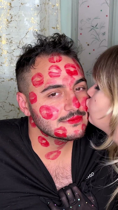 Red Lipstick Kisses Cover His Entire Face