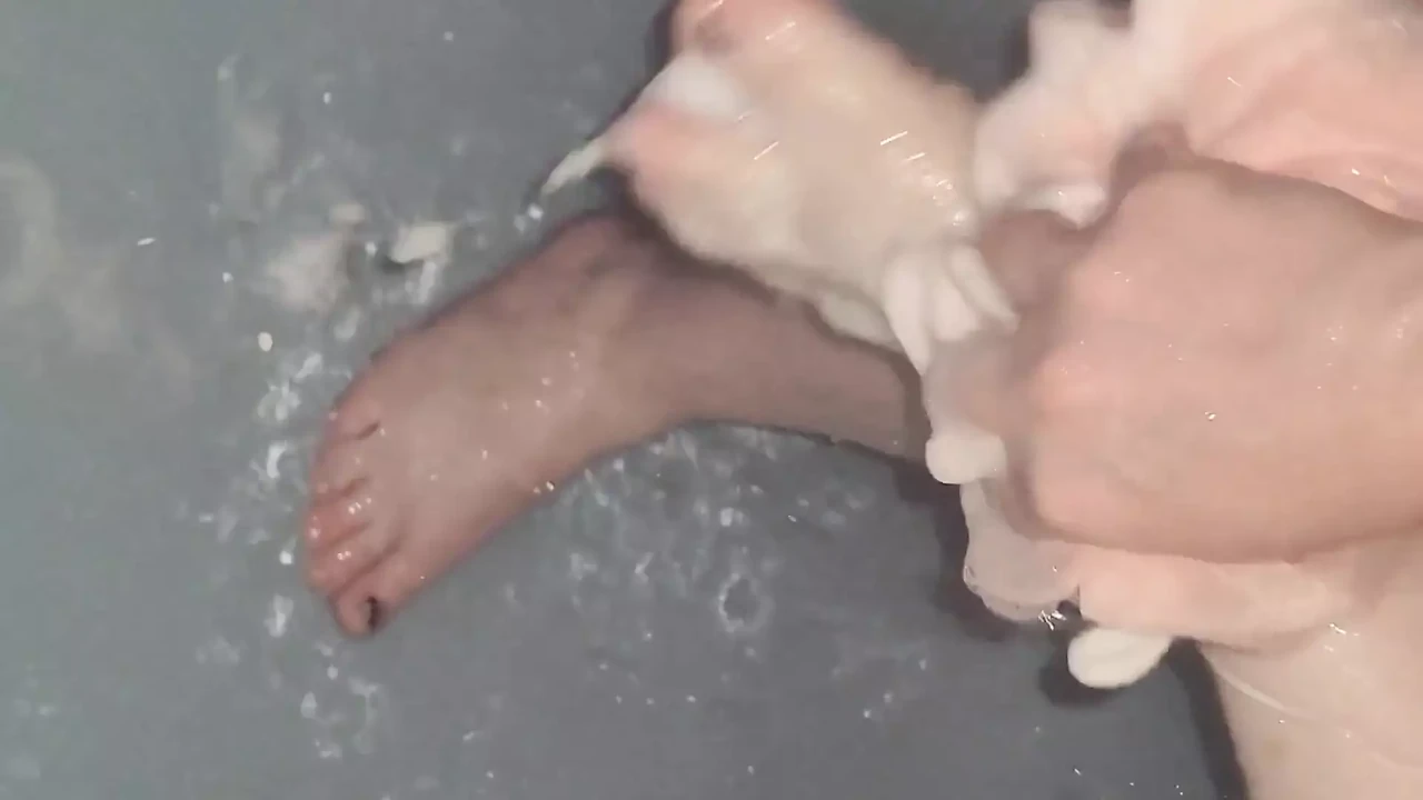 Scrubbing My Feet in Shower