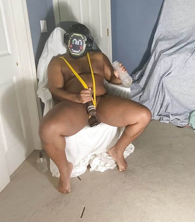 Masked Black Man In Mankini Stroking Out Cumshot With Fleshlight With Dildo In Ass