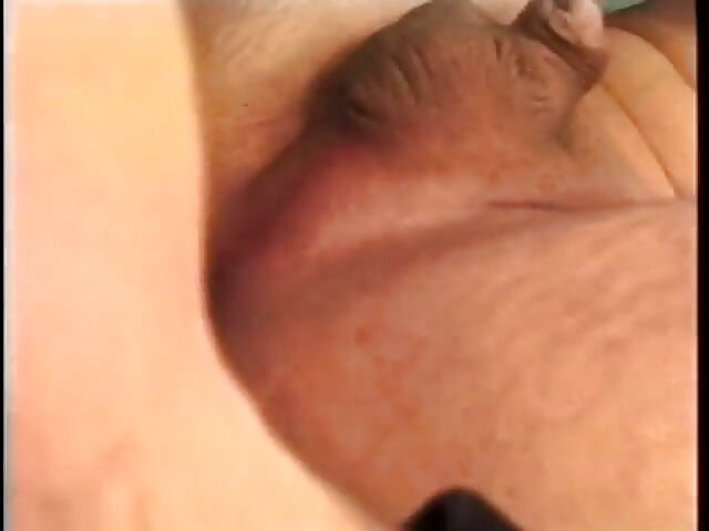 Hot tranny wearing long white boots spread her legs apart and let her ass licked