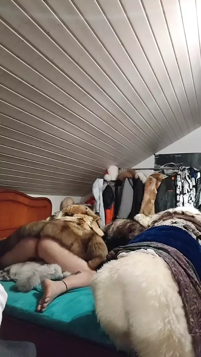 German man have fun in his fur bed