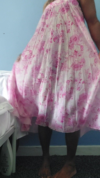 Shemale in a Silky seethrough floral fleared chiffon skirt