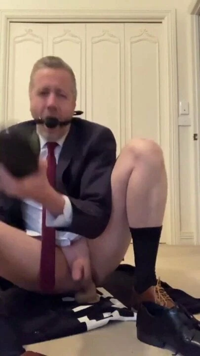 enjoy riding a dildo in suit