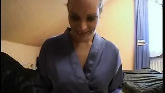 Busty blonde with round ass wearing stockings masturbating before getting cum on tits