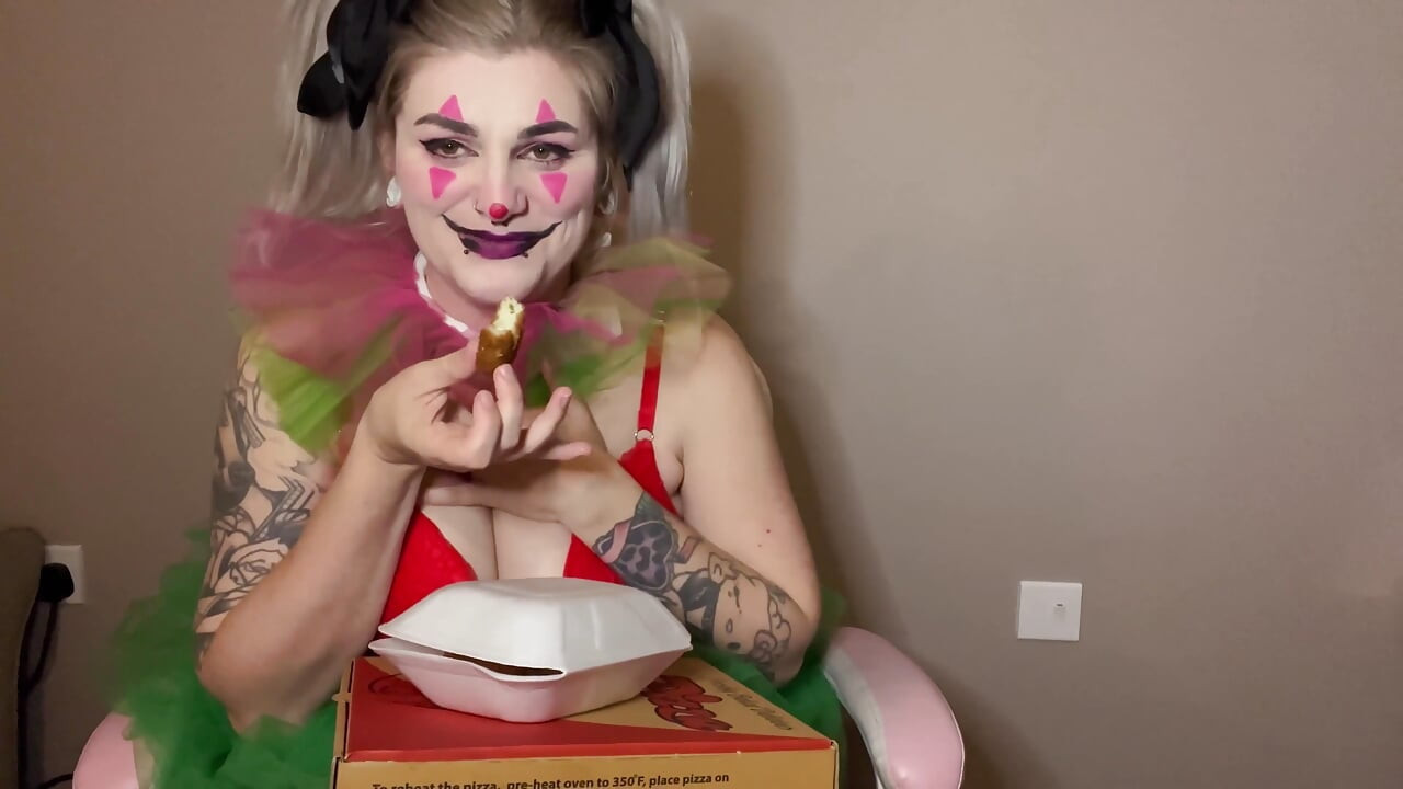 Trashy Clown Pigs Out on Takeaway Pizza