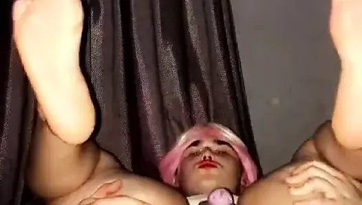 Slutty sissy dressed up showing her face playing with her toys