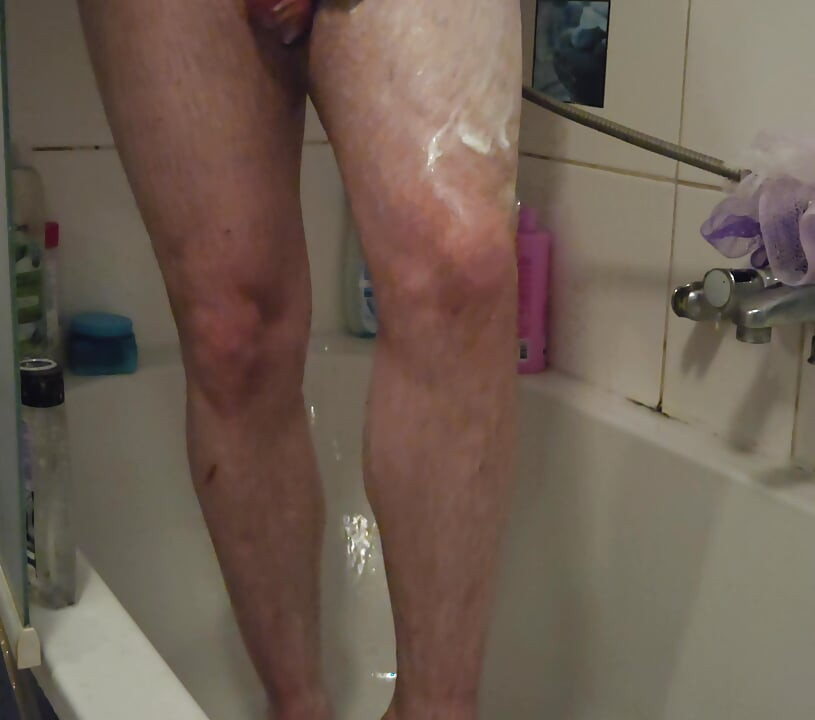 Young man in the shower