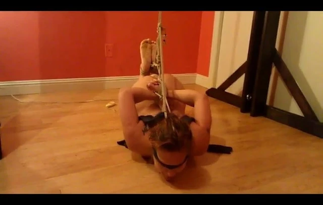 Hogtied slave drools while hitachi orgasm