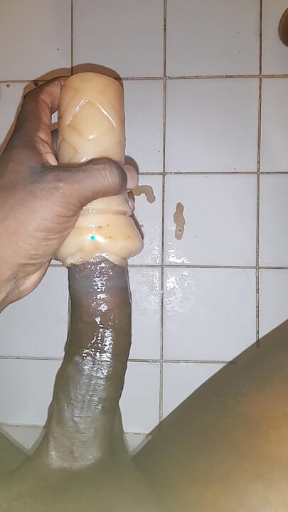 Blackguy jerking off and fucking tite fake Pussy