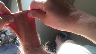 Three minutes of foreskin stretch in sunlight: spoon