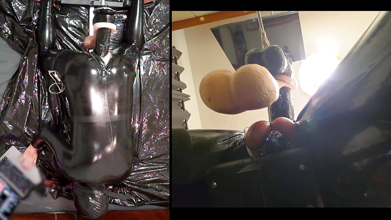 Session in the pillory with Latex Catsuit, PA Chastity, Giant Didildo and Estim
