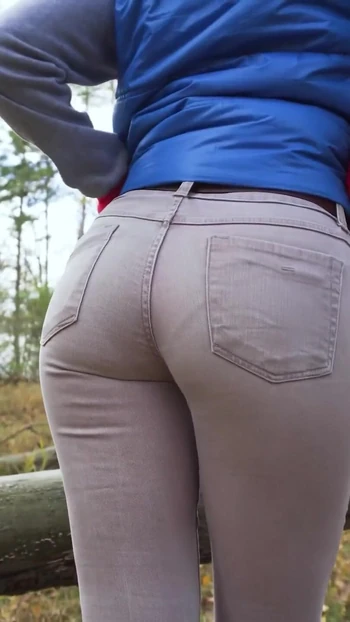 Stunning moment from "Real Amateur In Tight Pants Showing Off Her Visible Panty Line Ass Outdoor"