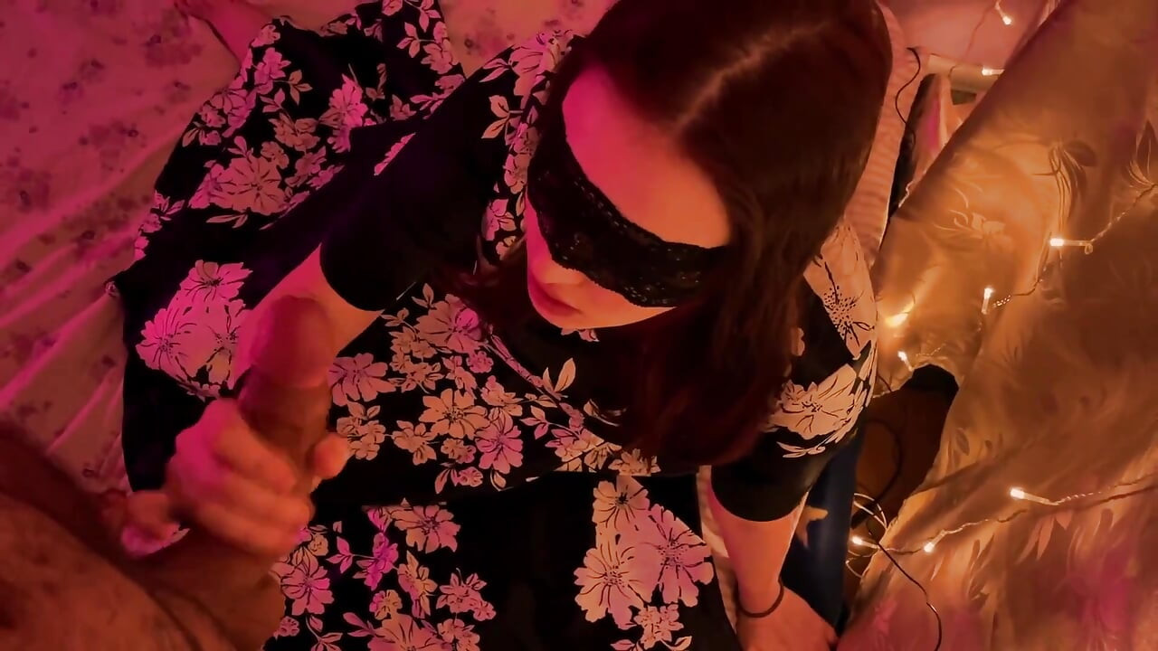 Holiday New Year blowjob from a beautiful woman in a mask and dress