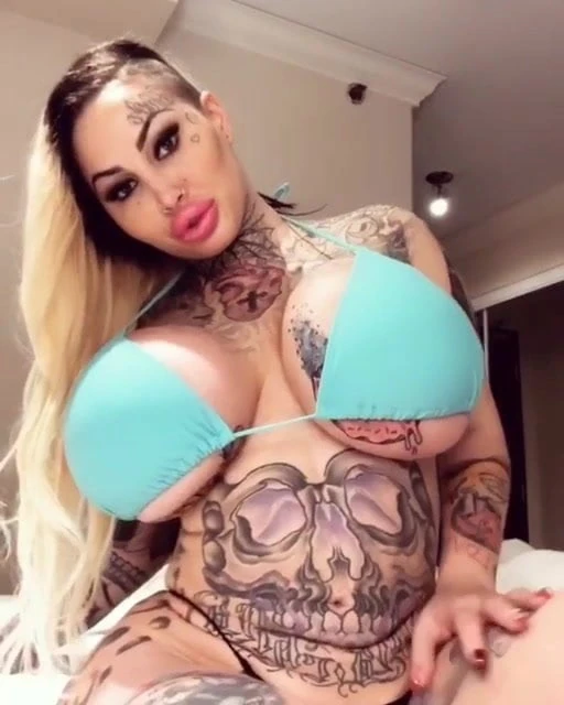 Bikini Bimbo Shows Off Her Ink