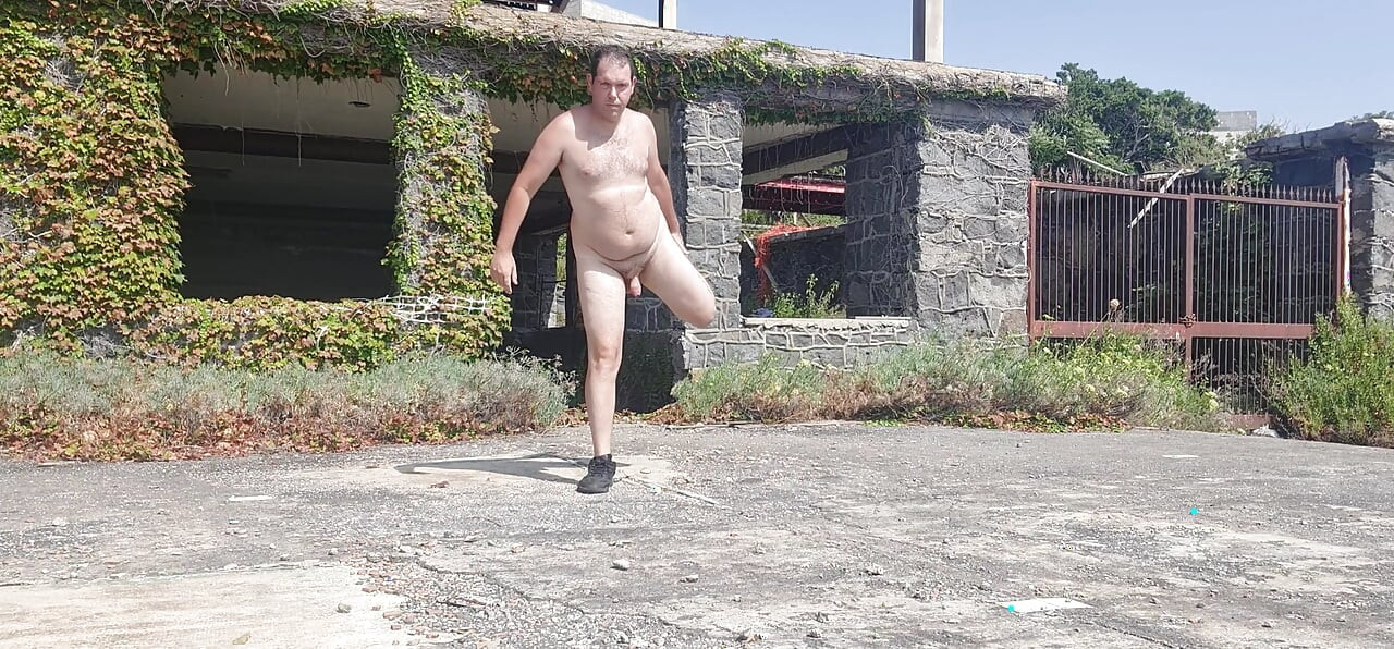 Boy completely naked near the sea