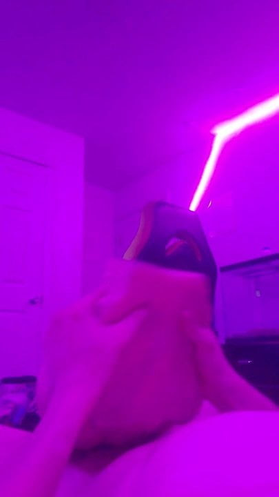Masturbating
