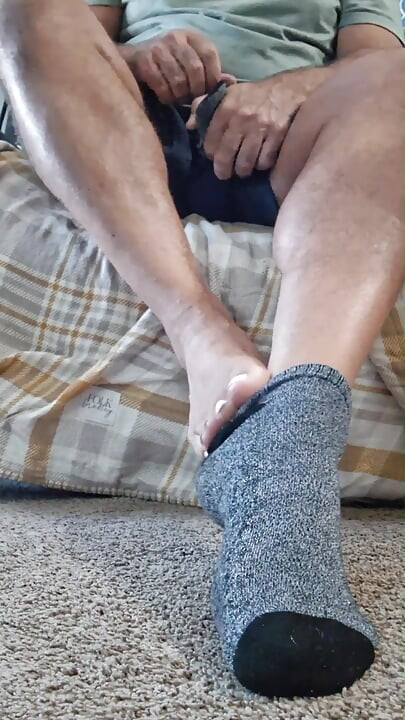 Taking off my socks and pissing on my painted toes
