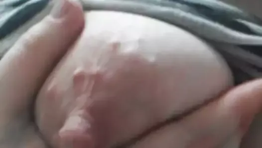 Squeezing out a little breast milk