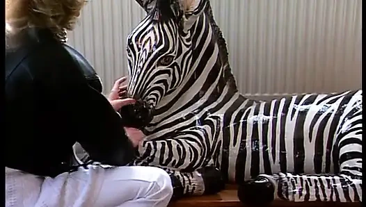 Cute blonde chick enjoys filling her pussy with a big dildo