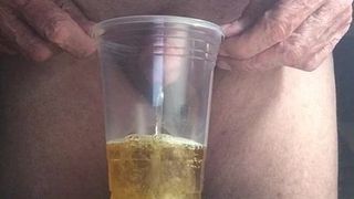 piss in a plastic cup