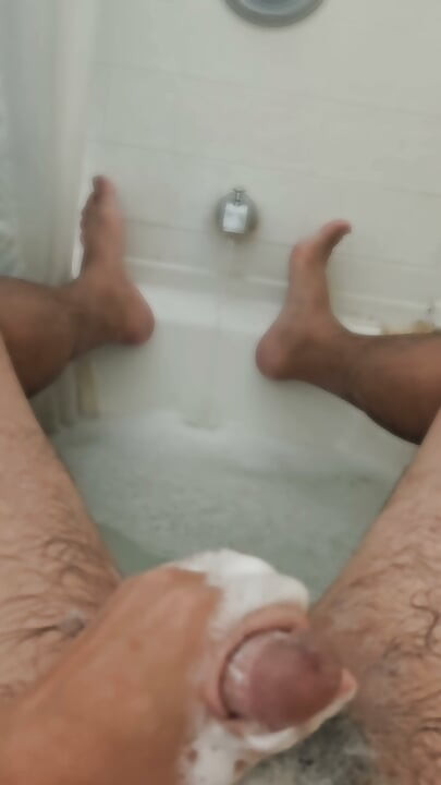 Cleaning Up in the Tub Bathing Solo and Rinsing Off
