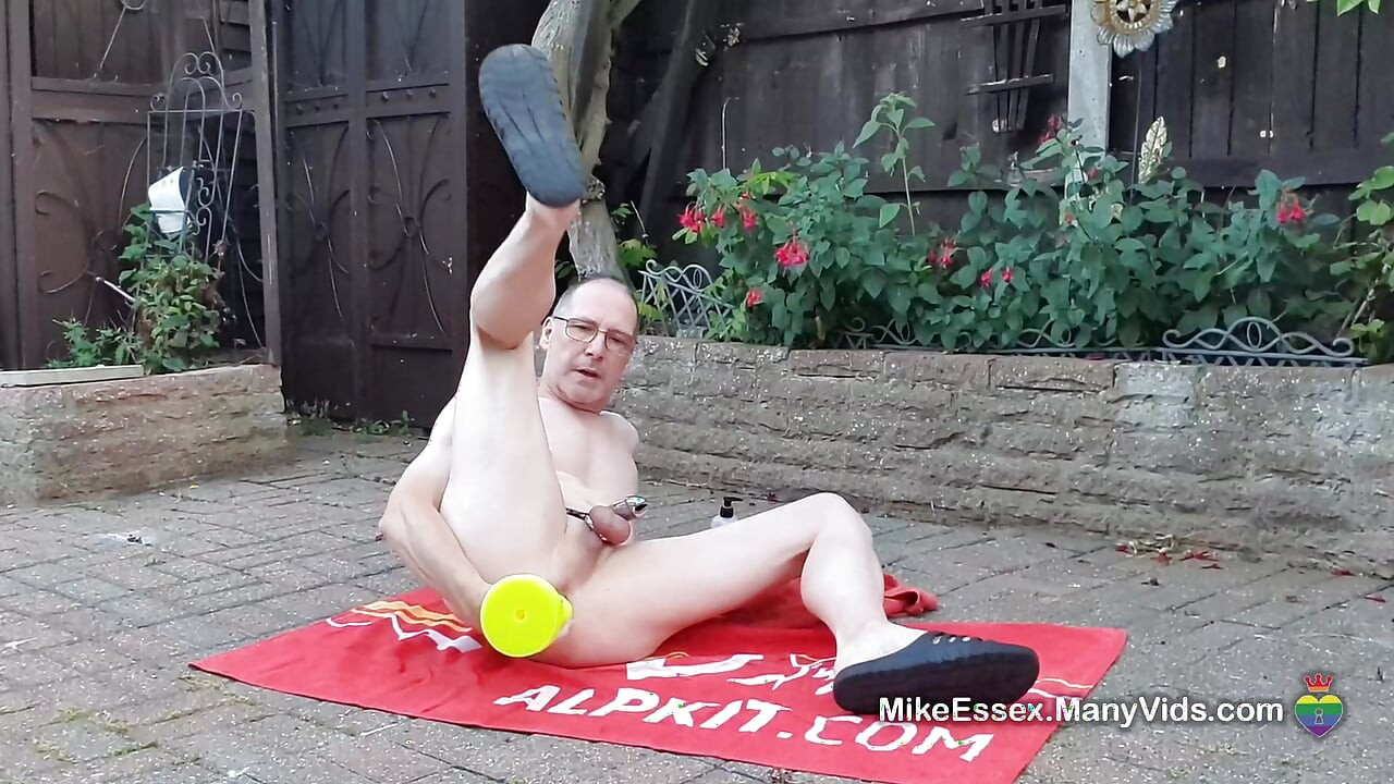 Outdoor anal dildo fun while locked in chastity with Mike Essex