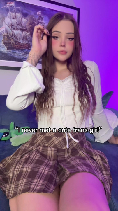 The cute femboy has a small cock under skirt