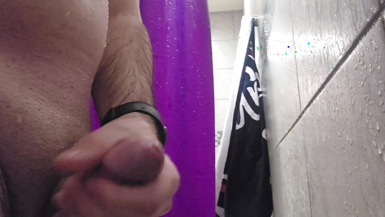 Solo jerk in public gym shower.