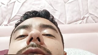 Man Masturbating in His Bed