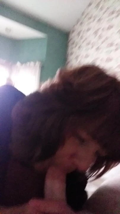 Redhead milf sucking cock