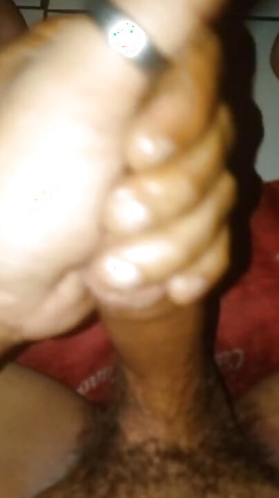 Shaking a hard cock until semen comes out